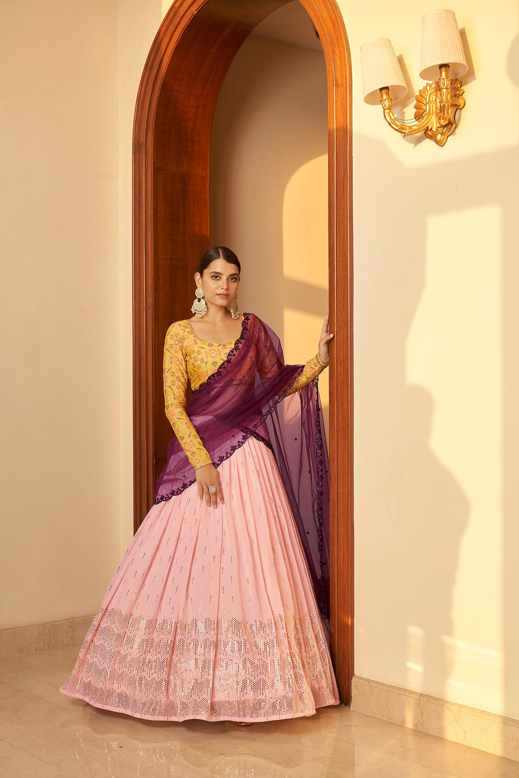Pink Embellished Mukaish Work Georgette Semi Stitched Lehenga