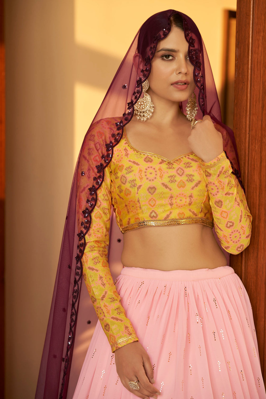 Pink Embellished Mukaish Work Georgette Semi Stitched Lehenga