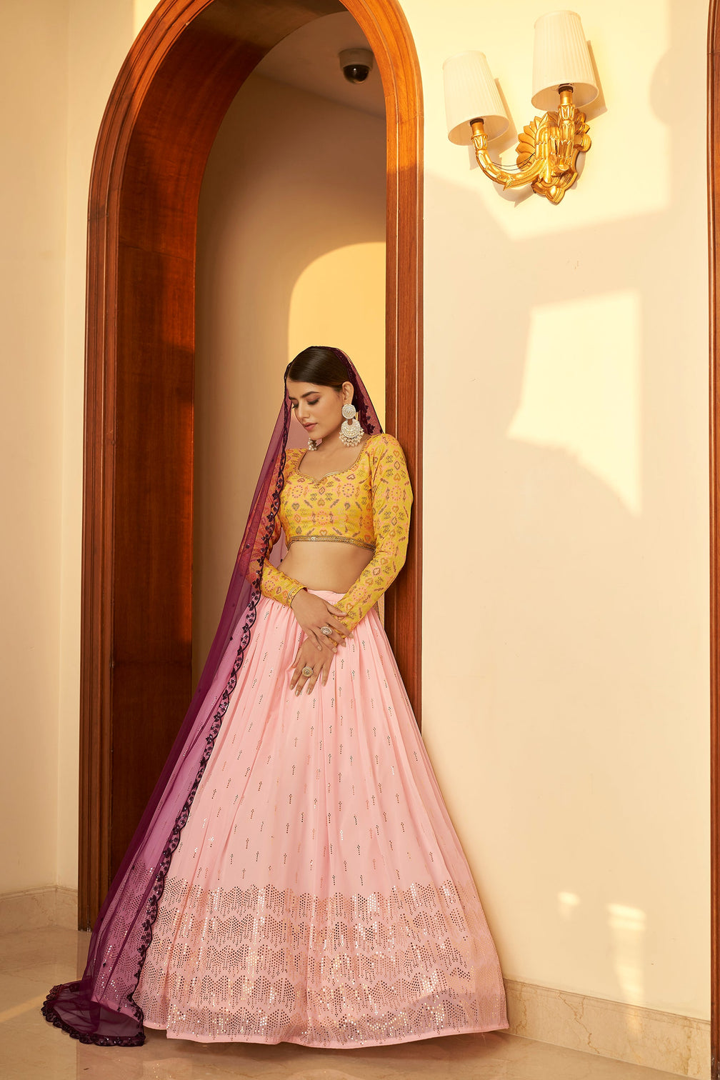 Pink Embellished Mukaish Work Georgette Semi Stitched Lehenga