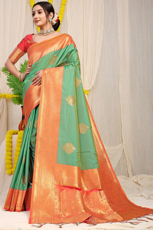 Gleaming Sea Green Banarasi Silk Saree With Forbearance Blouse Piece