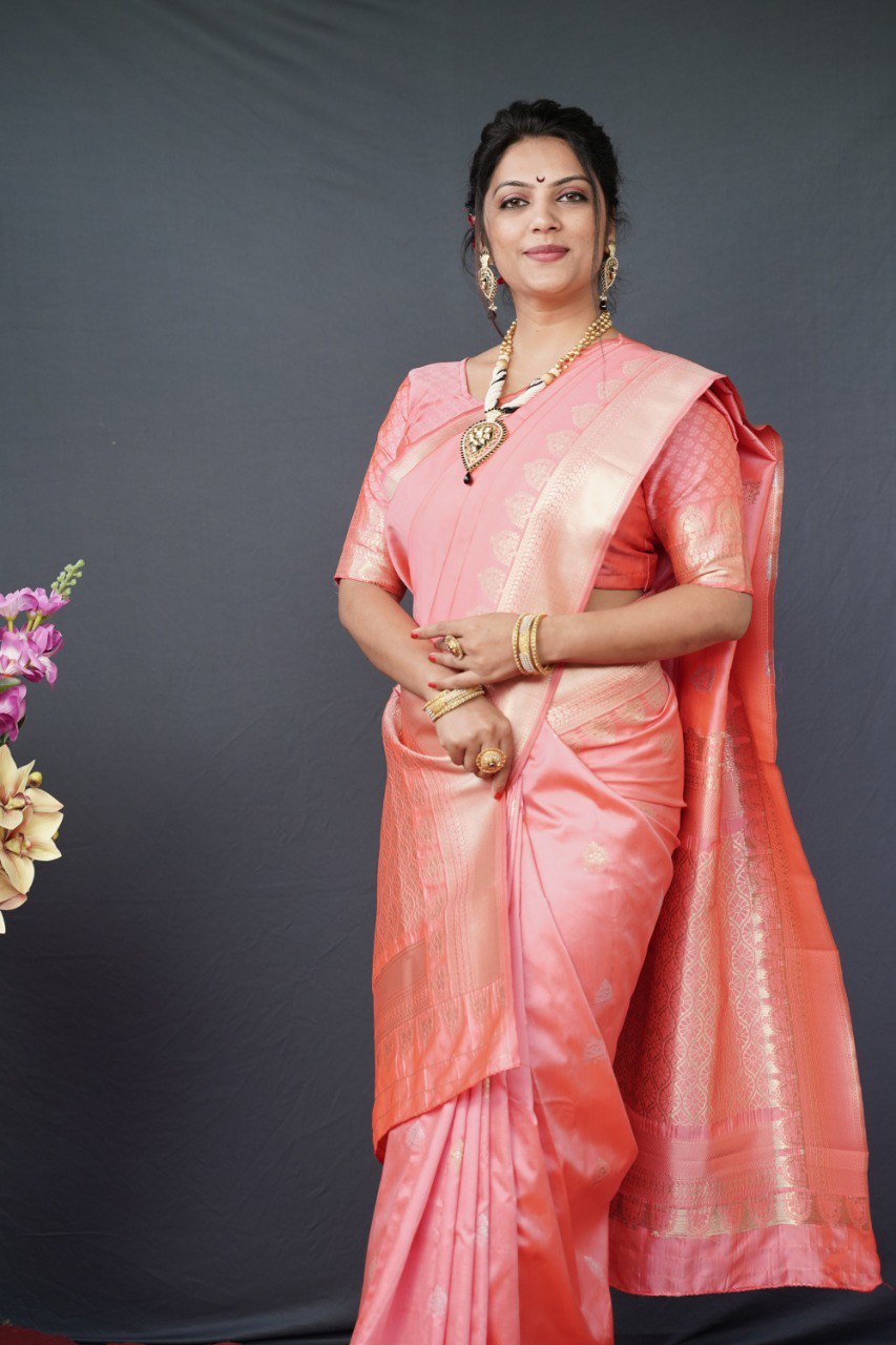 Adorning Baby Pink Banarasi Silk Saree With Classic Blouse Piece