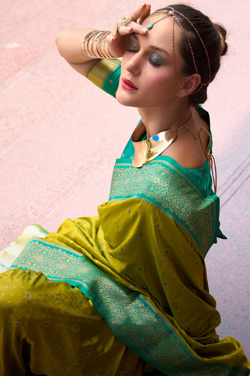 Lagniappe Mehndi Soft Banarasi Silk Saree With Staggering Blouse Piece