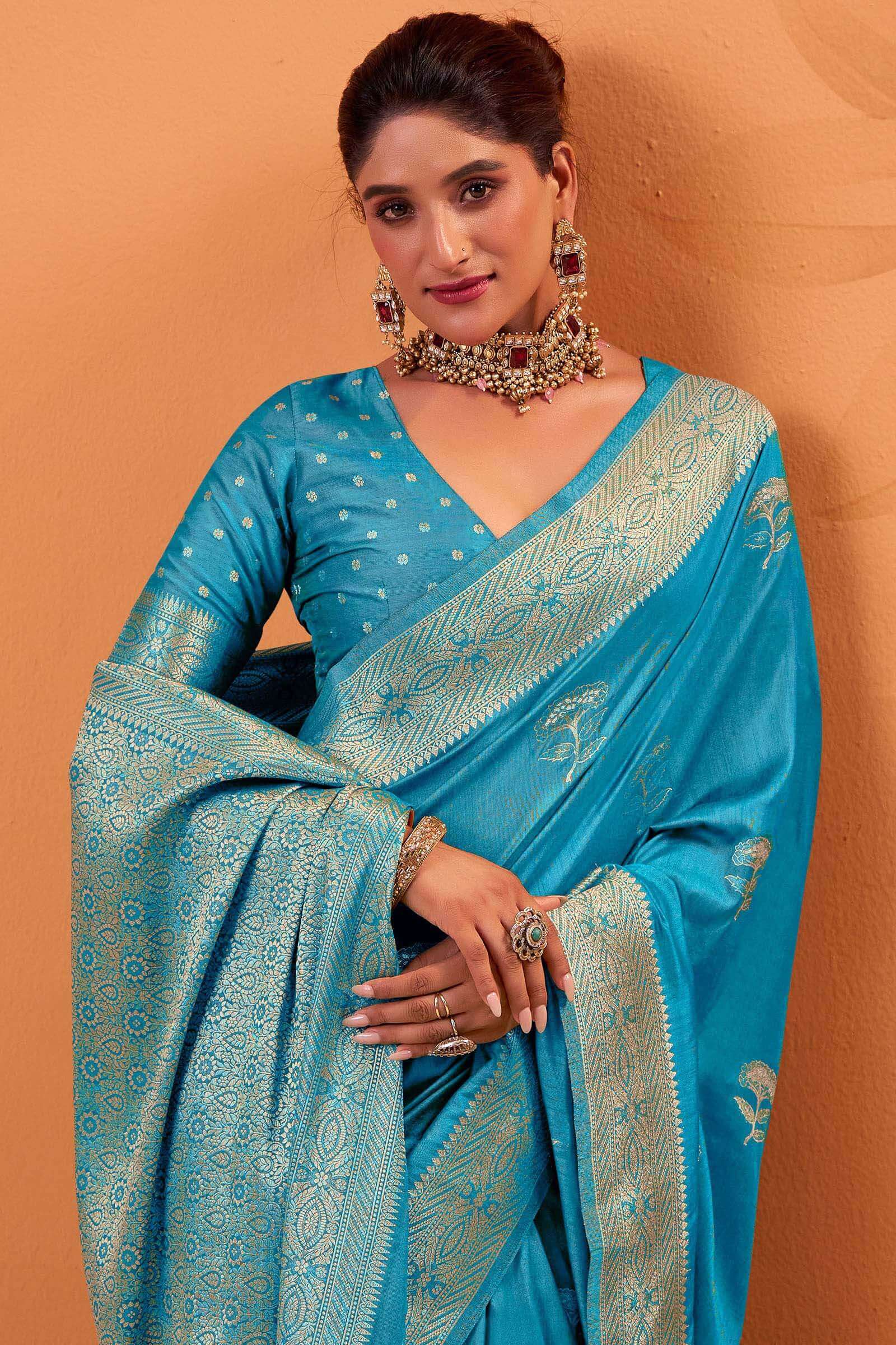 Supernal Firozi Banarasi Tussar Silk Saree With Rhapsody Blouse Piece