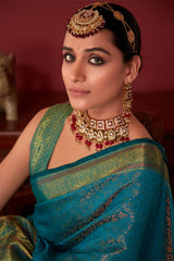 Ravishing Rama Kanjivaram Silk Saree With Flameboyant Blouse Piece