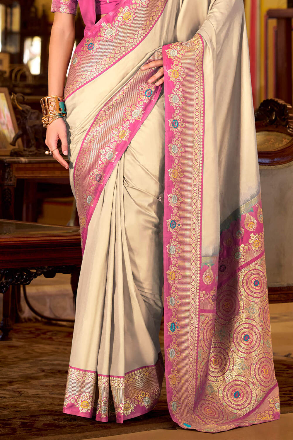 Twirling Beige Pure Zari Weaving Banarasi Silk Saree With Devastating Blouse Piece