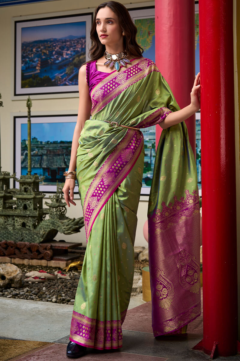 Invaluable Green Soft Banarasi Silk Saree With Scintilla Blouse Piece