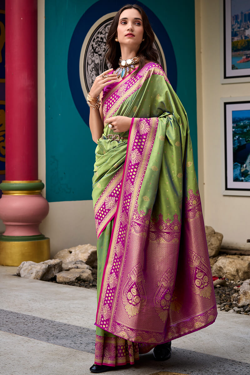 Invaluable Green Soft Banarasi Silk Saree With Scintilla Blouse Piece