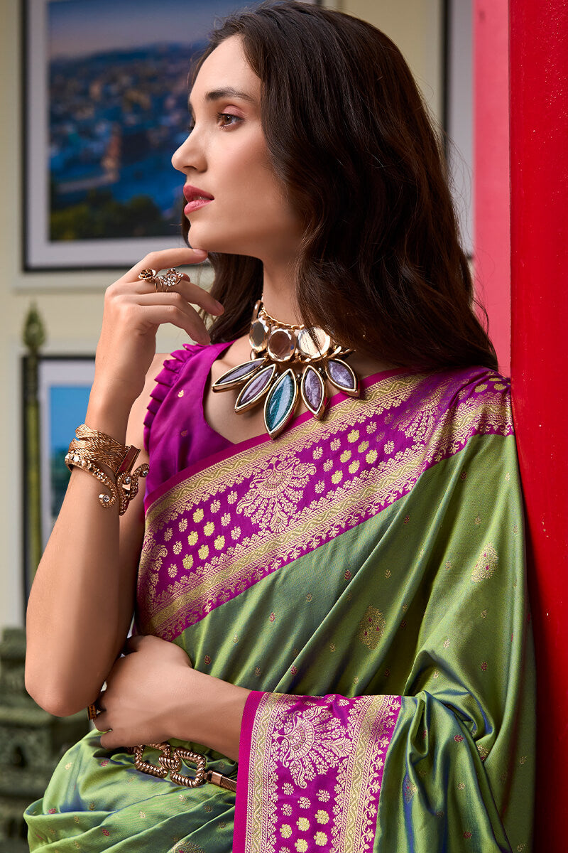 Invaluable Green Soft Banarasi Silk Saree With Scintilla Blouse Piece