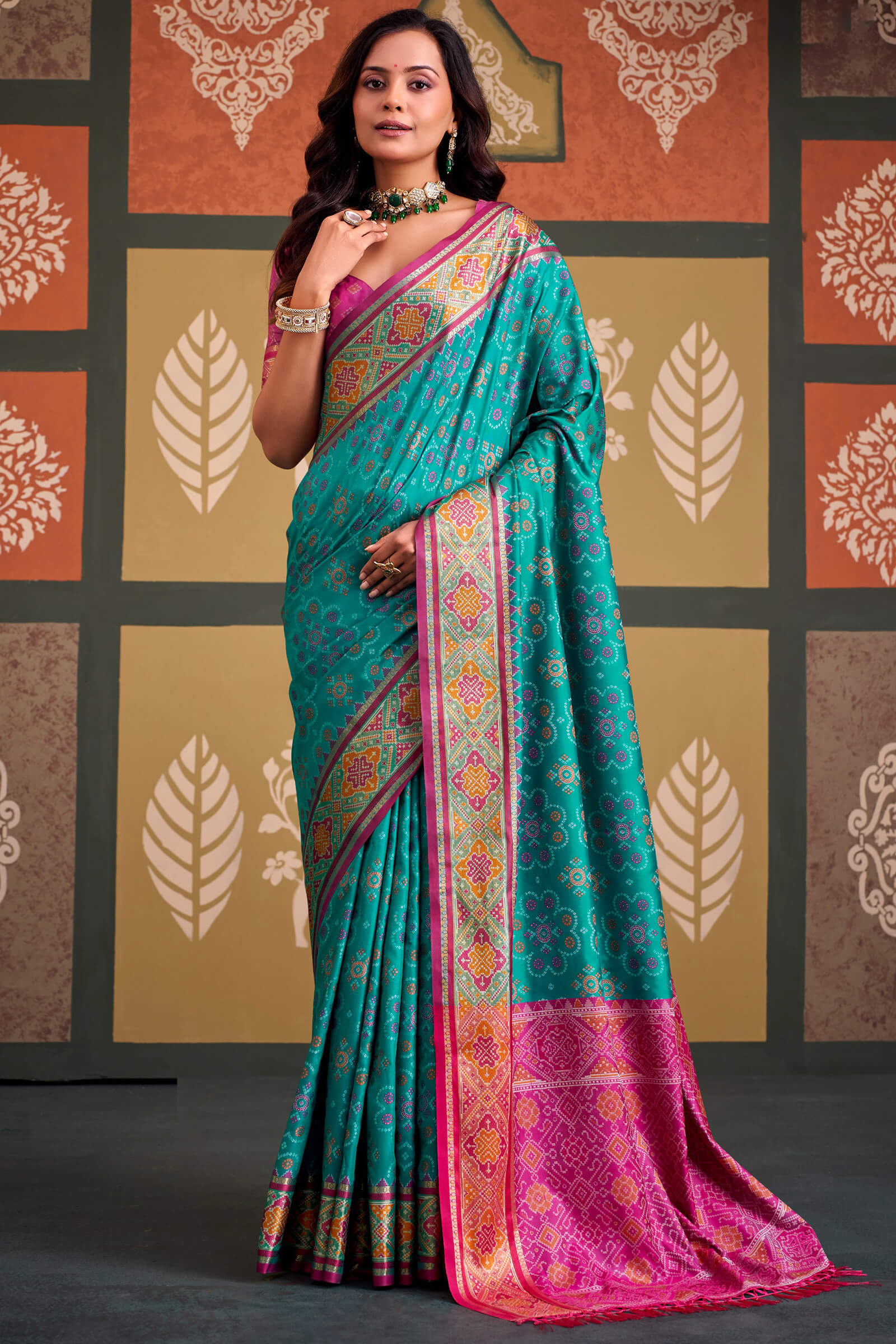 Adorning Firozi Patola Silk Saree with Trendy Blouse Piece