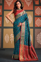Demanding Blue Patola Silk Saree with Magnetic Blouse Piece