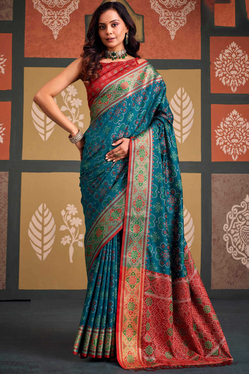 Demanding Blue Patola Silk Saree with Magnetic Blouse Piece