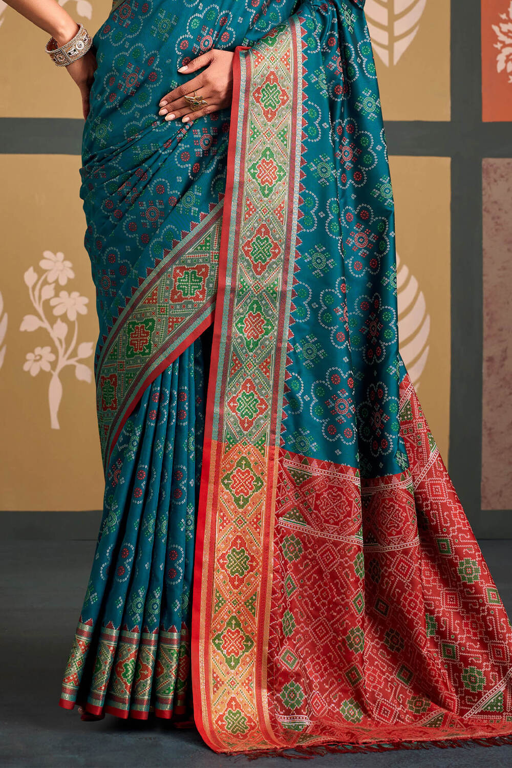 Demanding Blue Patola Silk Saree with Magnetic Blouse Piece