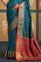Demanding Blue Patola Silk Saree with Magnetic Blouse Piece