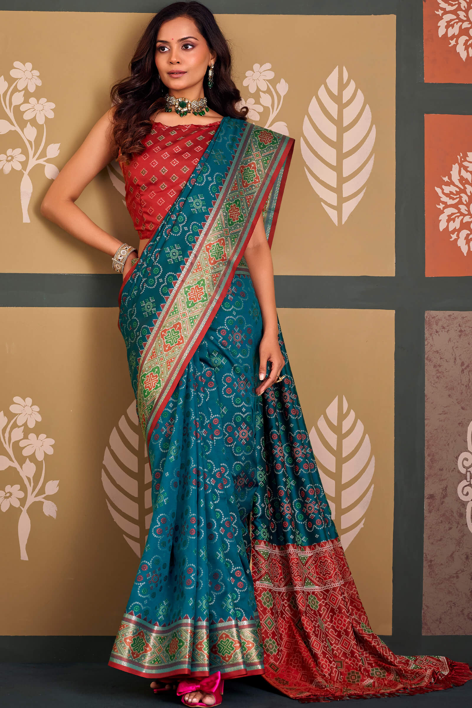 Demanding Blue Patola Silk Saree with Magnetic Blouse Piece