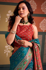 Demanding Blue Patola Silk Saree with Magnetic Blouse Piece