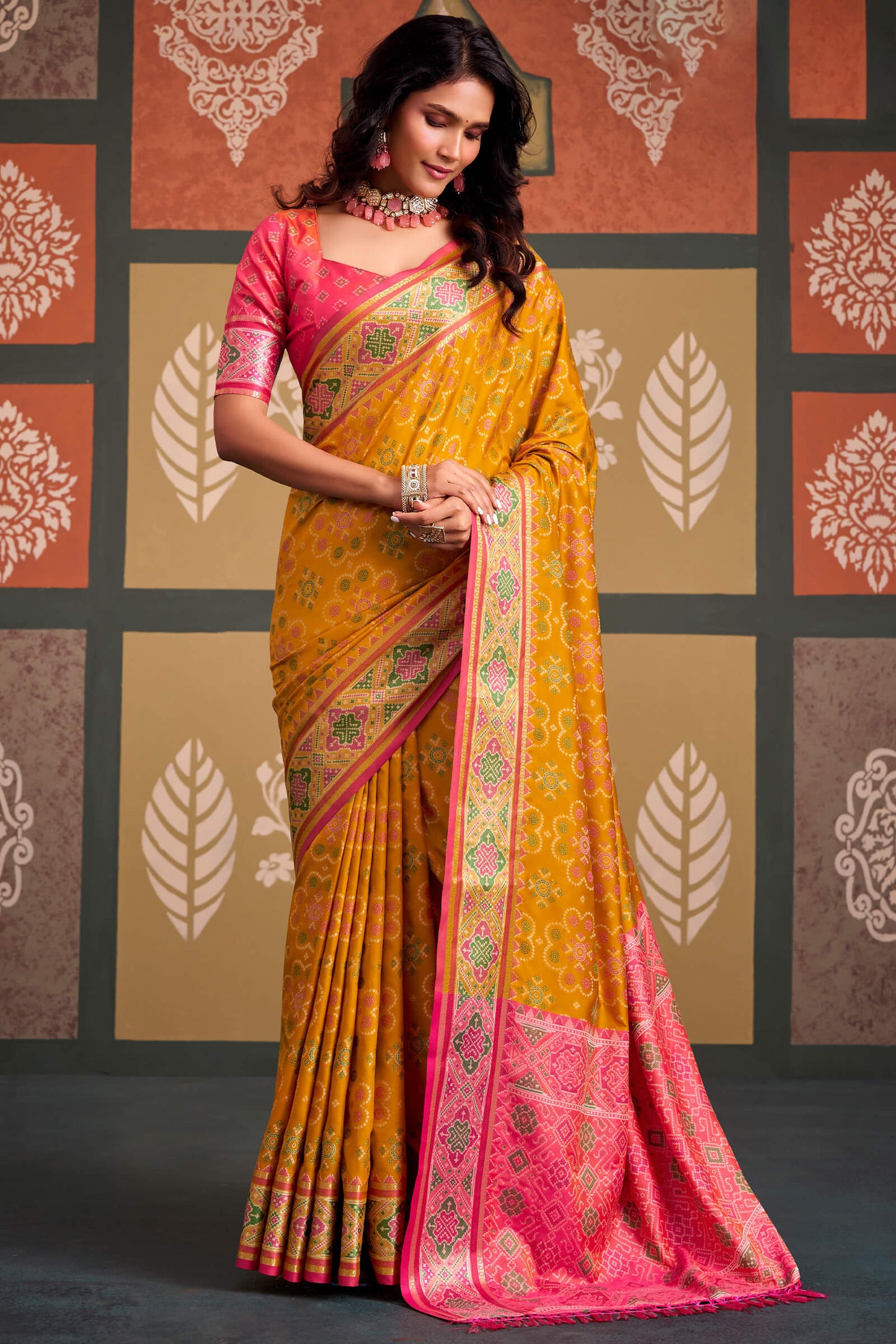 Unique Yellow Patola Silk Saree with Beauteous Blouse Piece