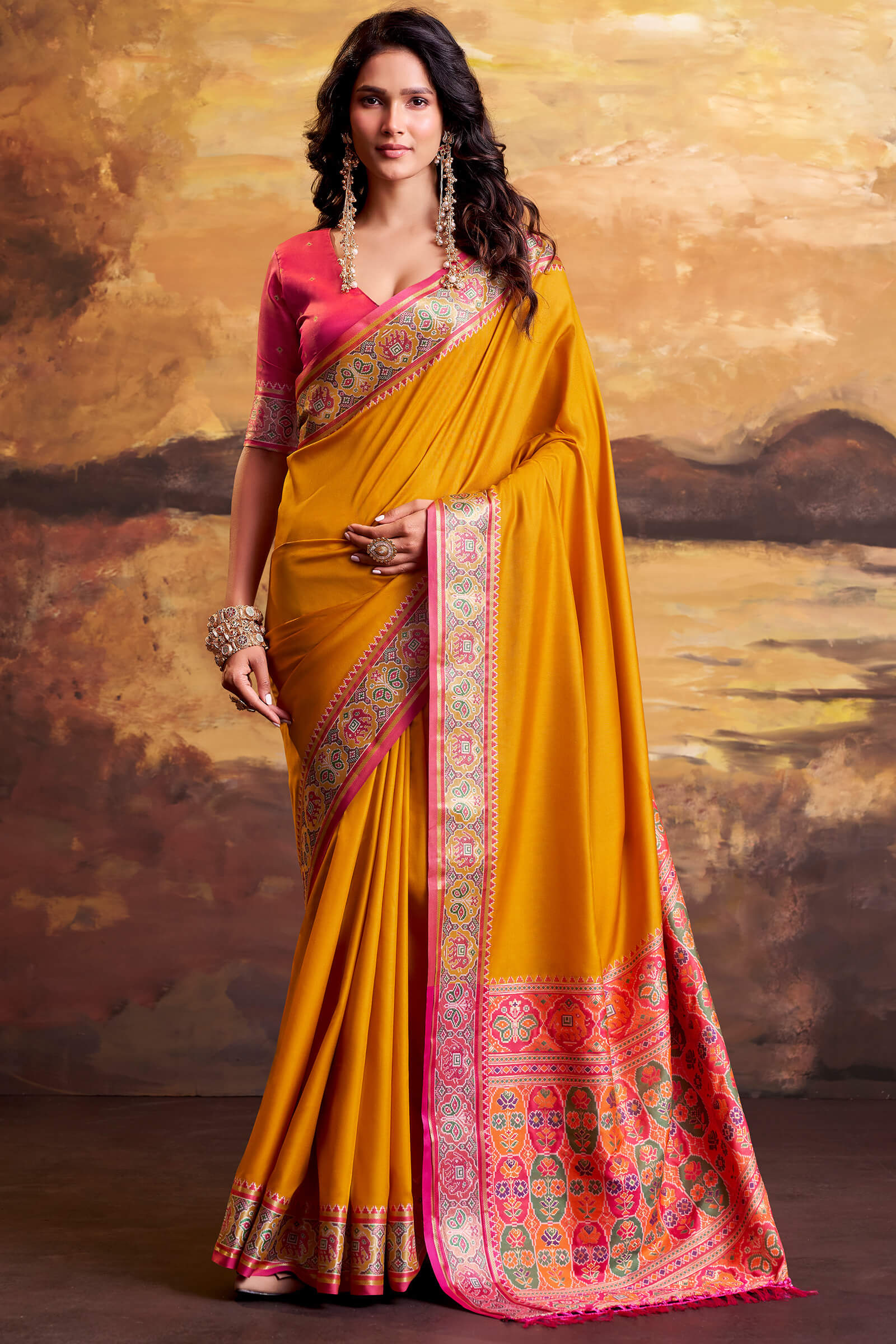 Skinny Yellow Patola Silk Saree with Luminous Blouse Piece