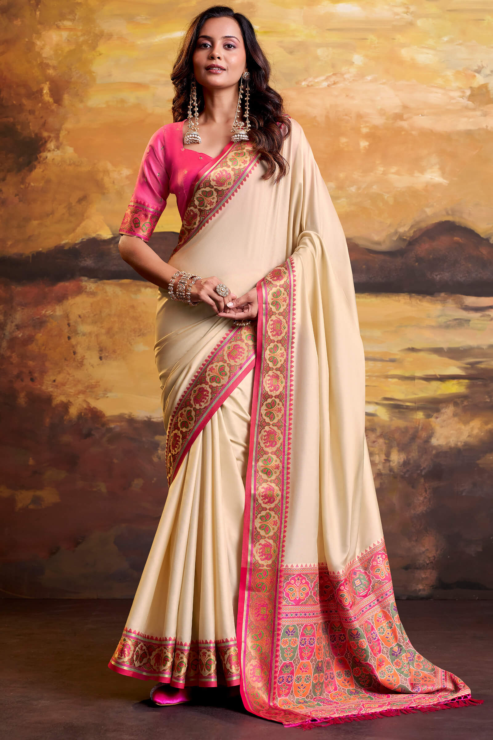 Phenomenal Beige Patola Silk Saree with Pulsating Blouse Piece
