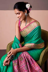 Sizzling Rama Patola Silk Saree with Beautiful Blouse Piece