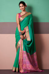 Sizzling Rama Patola Silk Saree with Beautiful Blouse Piece