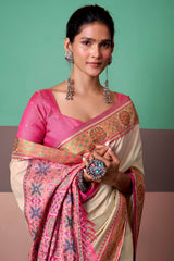 Engaging Beige Patola Silk Saree with Luxuriant Blouse Piece