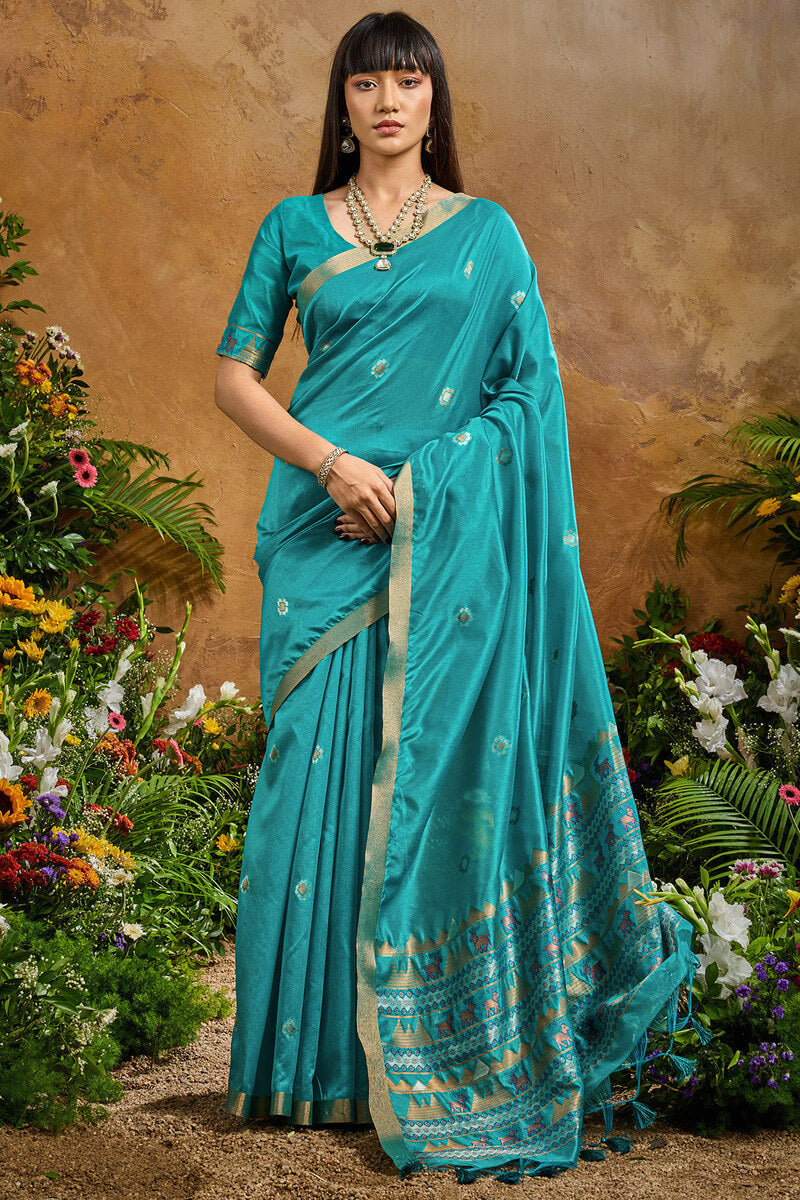 Redolent Firozi Banarasi Tussar Silk Saree With Enigmatic Blouse Piece