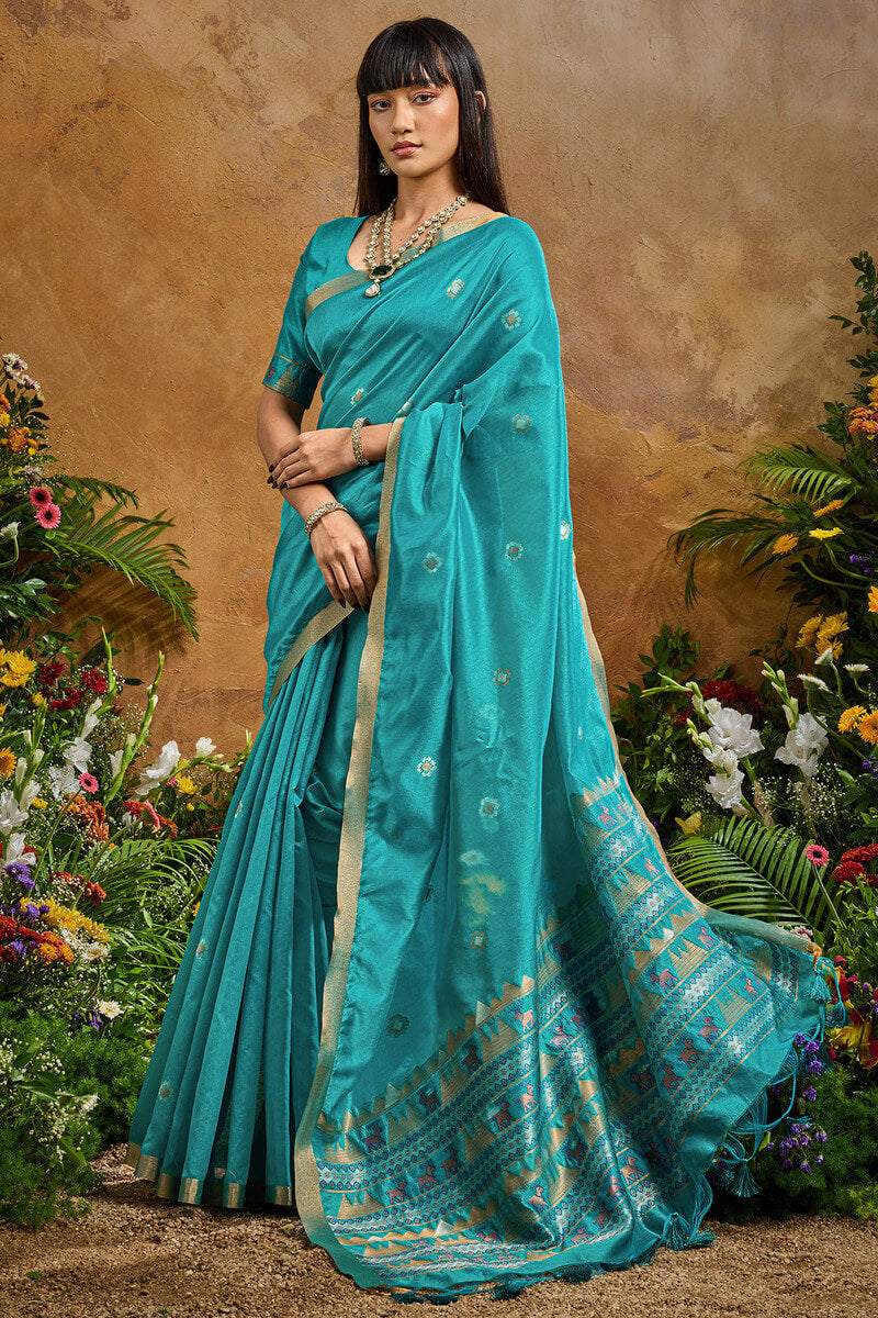 Redolent Firozi Banarasi Tussar Silk Saree With Enigmatic Blouse Piece