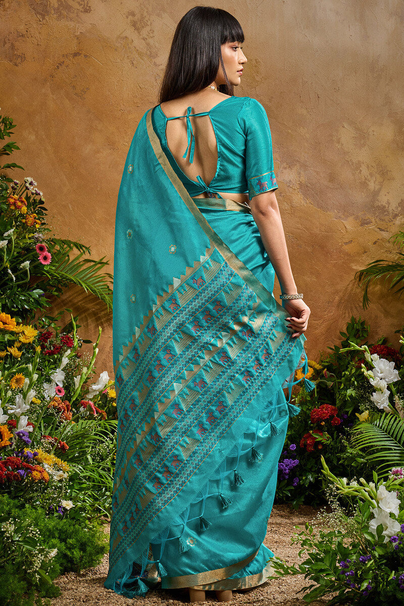 Redolent Firozi Banarasi Tussar Silk Saree With Enigmatic Blouse Piece
