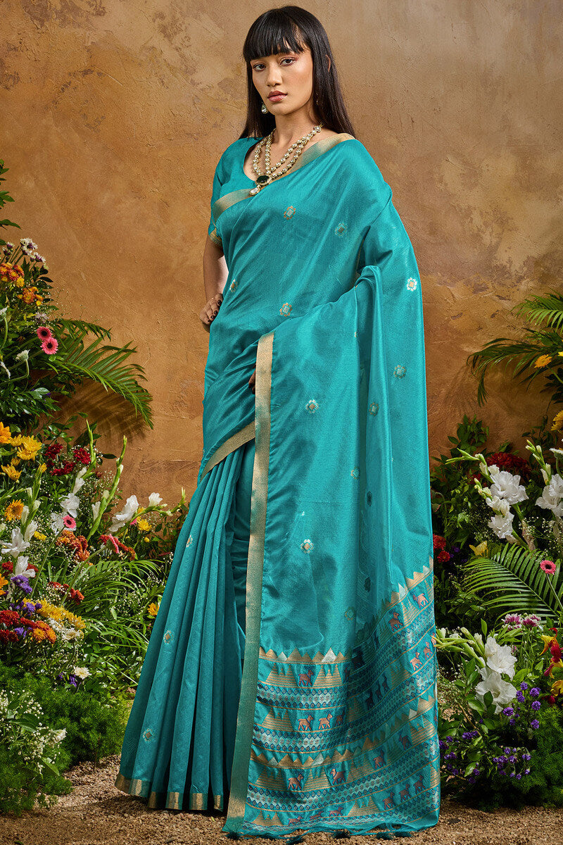 Redolent Firozi Banarasi Tussar Silk Saree With Enigmatic Blouse Piece