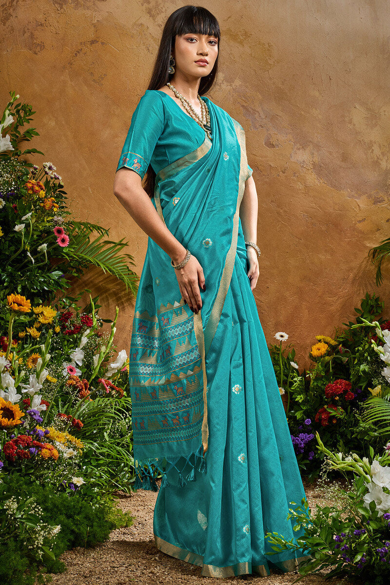 Redolent Firozi Banarasi Tussar Silk Saree With Enigmatic Blouse Piece