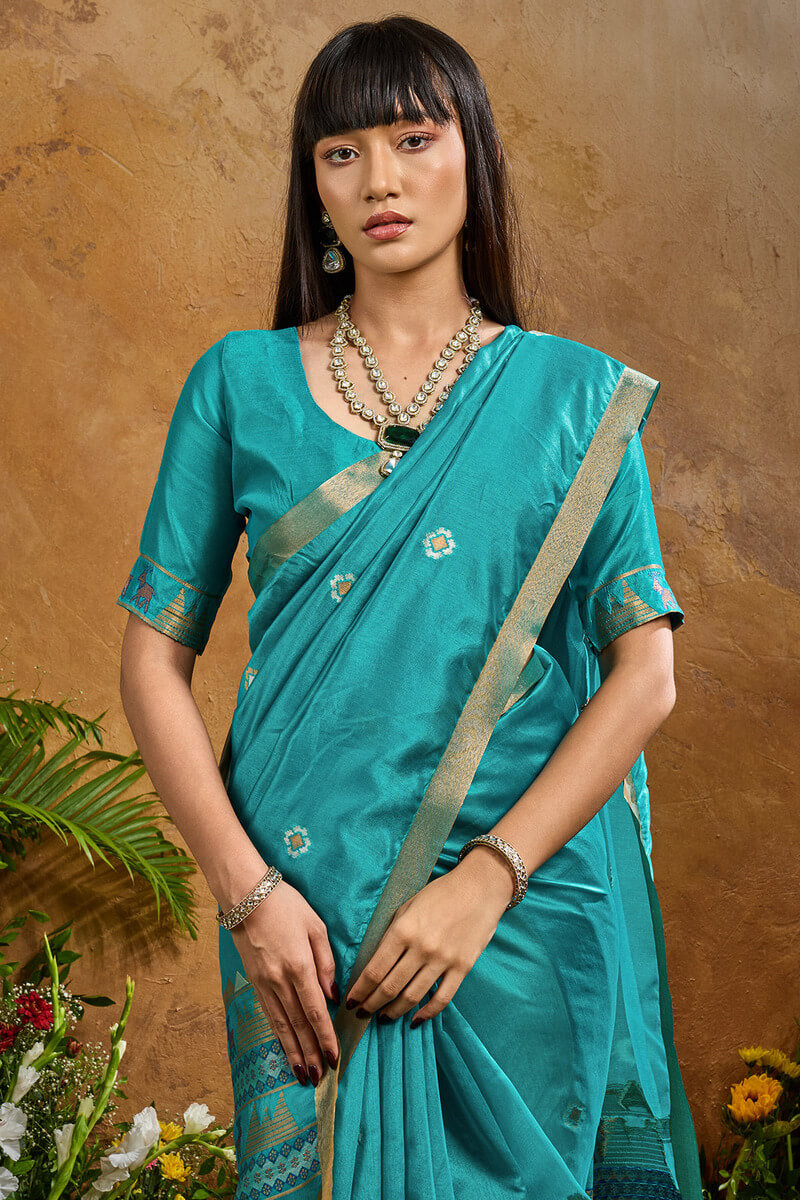 Redolent Firozi Banarasi Tussar Silk Saree With Enigmatic Blouse Piece