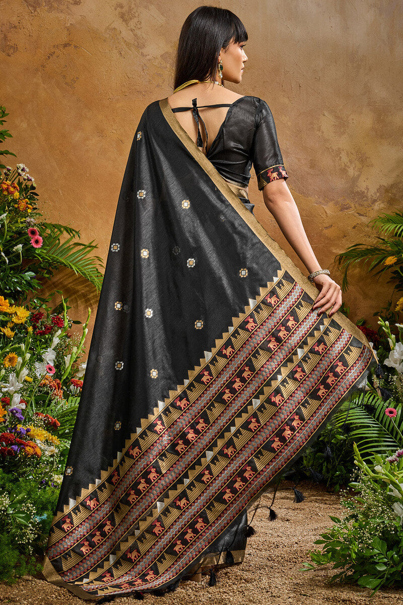 Opulent Black Banarasi Tussar Silk Saree With Nectarous Blouse Piece