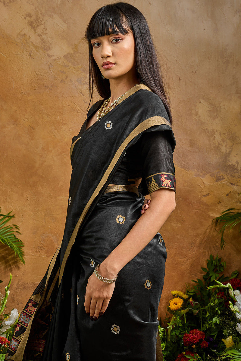 Opulent Black Banarasi Tussar Silk Saree With Nectarous Blouse Piece
