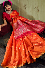 Denouement Orange Banarasi Handloom Silk Saree With Splendorous Blouse Piece