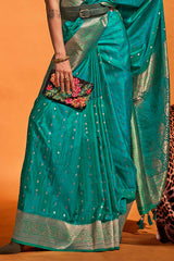 Fugacious Rama Soft Banarasi Silk Saree With Ineffable Blouse Piece