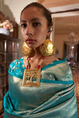 Sonorous Firozi Soft Banarasi Silk Saree With Charismatic Blouse Piece