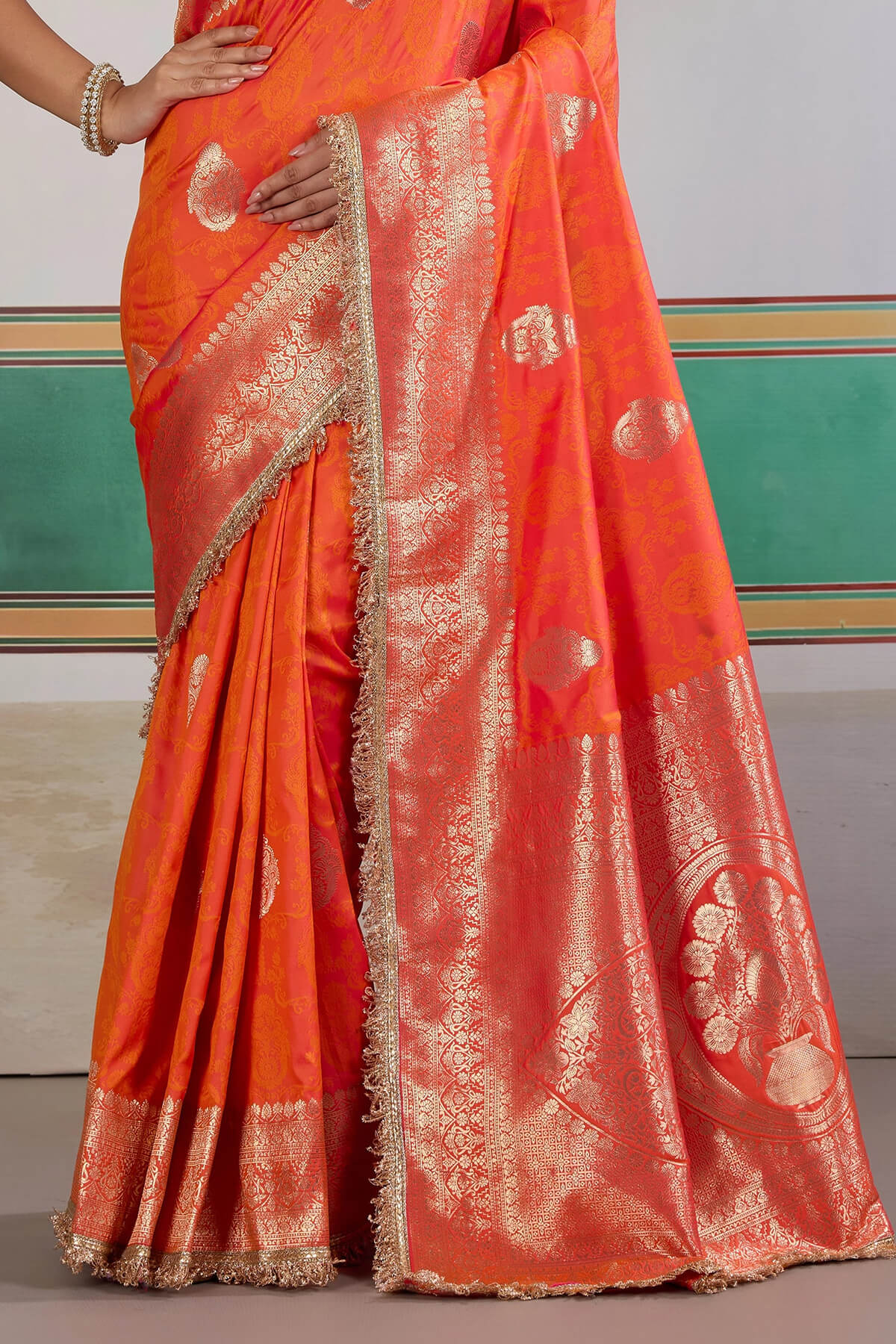 Proficient Orange Pure Zari Weaving Banarasi Silk Saree With Fancy Lace Border