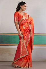 Proficient Orange Pure Zari Weaving Banarasi Silk Saree With Fancy Lace Border