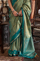 Alluring Green Banarasi Tussar Silk Saree With Surreptitious Blouse Piece