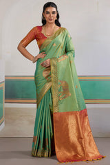 Engrossing Sea Green Pure Zari Weaving Banarasi Silk Saree With Efflorescence Blouse Piece