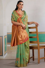 Engrossing Sea Green Pure Zari Weaving Banarasi Silk Saree With Efflorescence Blouse Piece