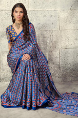 Inimitable Navy Blue Ajrakh Printed Satin Silk Saree With Whimsical Blouse Piece