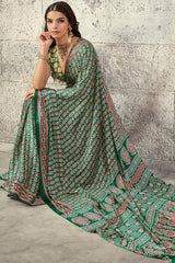 Prominent Green Ajrakh Printed Satin Silk Saree With Prettiest Blouse Piece