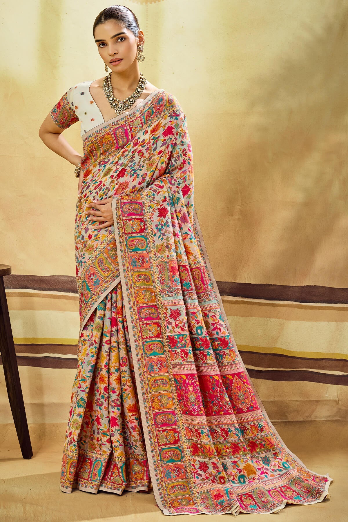 Glamorous Beige Pashmina Saree With Charming Blouse Piece