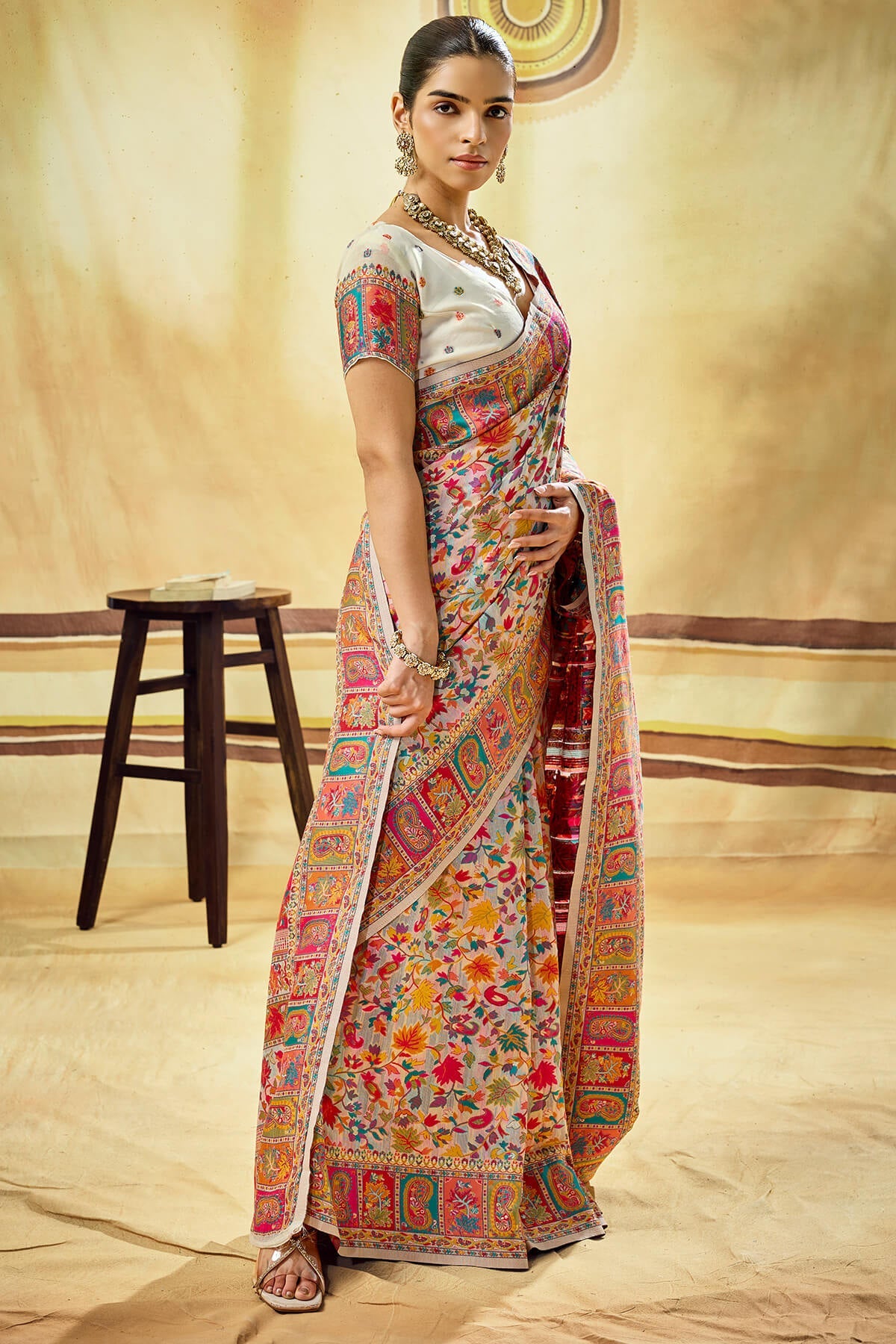Glamorous Beige Pashmina Saree With Charming Blouse Piece