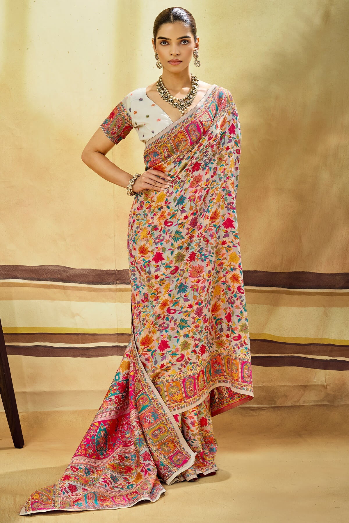 Glamorous Beige Pashmina Saree With Charming Blouse Piece