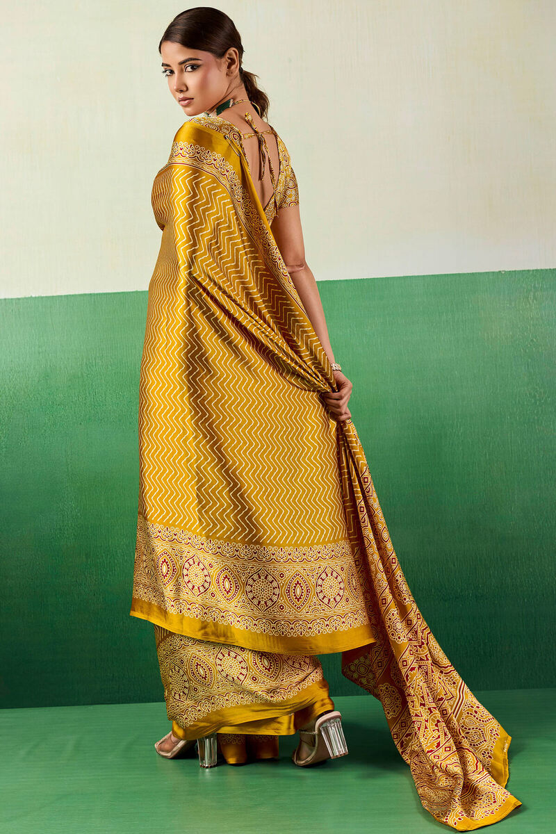 Posh Yellow Ajrakh Printed Semi Modal Silk Saree With Imbrication Blouse Piece