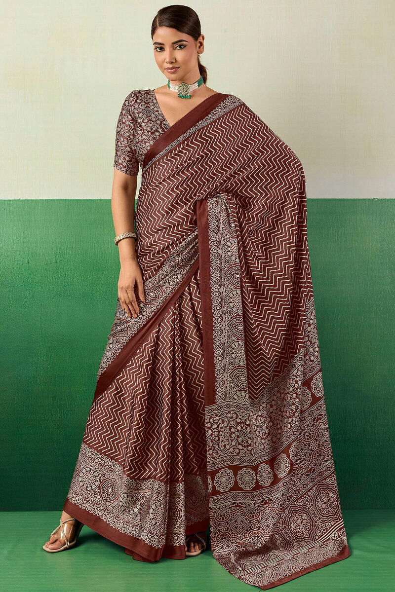 Ornate Brown Ajrakh Printed Semi Modal Silk Saree With Imaginative Blouse Piece