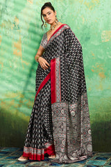 Amazing Black Ajrakh Printed Semi Modal Silk Saree With Beguiling Blouse Piece