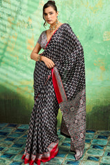 Amazing Black Ajrakh Printed Semi Modal Silk Saree With Beguiling Blouse Piece